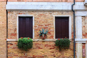 Fototapeta na wymiar The old window in Venice, Italy