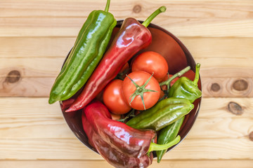 red and green peppers on kitchen table