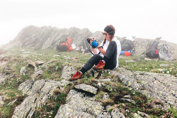 Girl travels in the mountains.