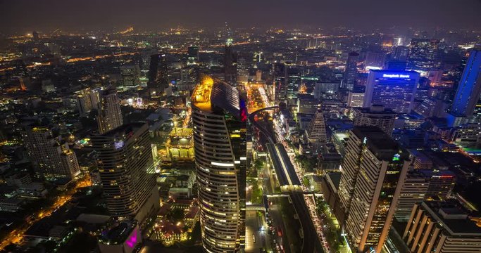 Aerial Time lapse of Bangkok urban cityscape at night.