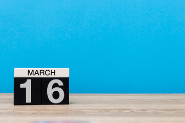 March 16th. Day 16 of march month, calendar on light blue background. Spring time, empty space for text, mockup