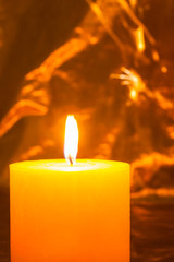 Single lit candles.Candles new year.