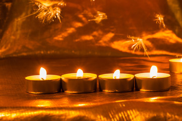 Single lit candles.Candles new year.