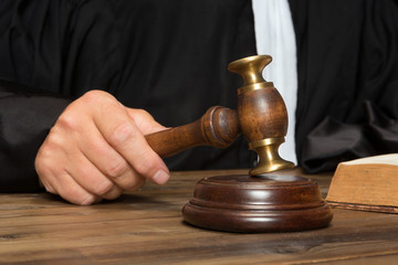 Hand with gavel