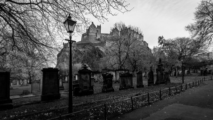 Old Cemetery with Edinburgh Castle in Background, Scotland Black and White High Contrast Photography - 195389072