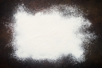 Flour on dark background.