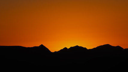 mountain silhouette in the Negev desert in Israel at sunset sunrise