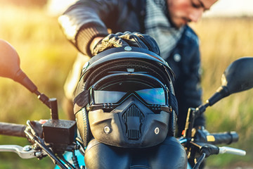 Man on sport motorcycle outdoor on the road