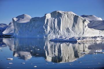 Fototapeta na wymiar Greenland. Giant icebergs near the village of Ilulissat