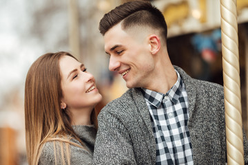 Lovely couple have fun time and smile to each other