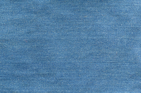 Blue jeans textile. Denim texture close up