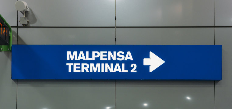 Sign pointing towards Malpensa Terminal 2, which services national as well as EasyJet flights throughout Europe.
