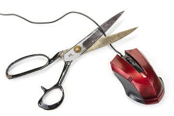 Computer mouse with black cable  and scissors. Cut out or wireless connection