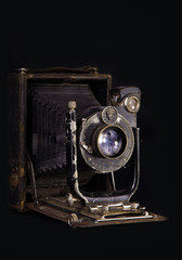 old camera on a black background