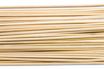 Close-up small brown wood isolated on white background. It copy space and selection focus.