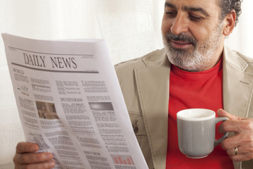 man reading newspaper