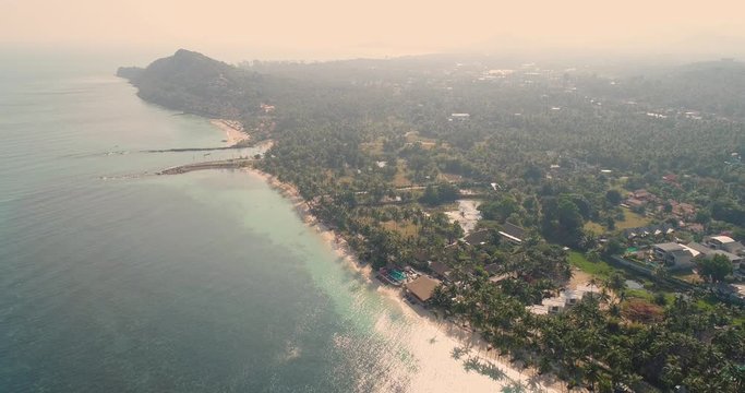 great aerial drone flight over beautiful beach and sea in thailand, koh samui