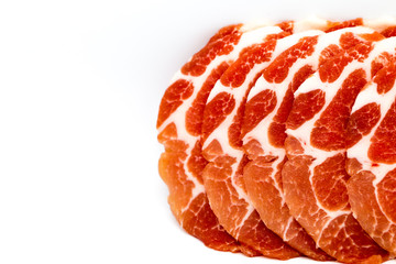 Close-up sliced raw pork isolated on white background. It copy space and selection focus.
