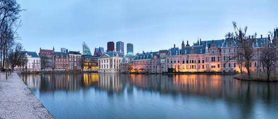 City Landscape, sunset panorama - view on pond Hofvijver and complex of buildings Binnenhof in from...