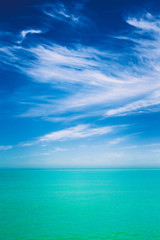 Fototapeta na wymiar Sky Over Calm Water Of Sea Or Ocean. Natural Background With Gently Blue Colors.