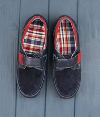 dark blue suede moccasins with Velcro for boy