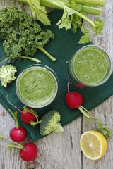 Green smoothies with cabbage kale, broccoli and celery. Selective focus
