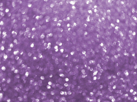 purple blurred glittering shining background