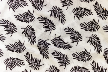 Seamless pattern with black leaves on white background