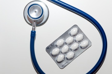 Pills and Stethoscope.