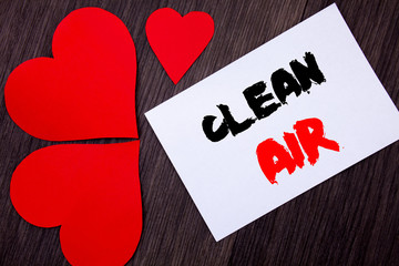 Writing text showing  Clean Air. Concept meaning Global Environmental Health For Industry Pollution written on notobook paper note on the wooden background with Love Heart.