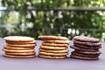  Stacks of chocolate cookies, cookies with chocolate drops, cookies with oatmeal.
