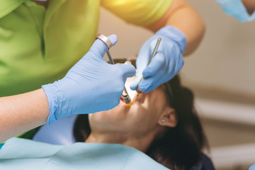 The dentist does anesthetic injection. Local anesthesia.