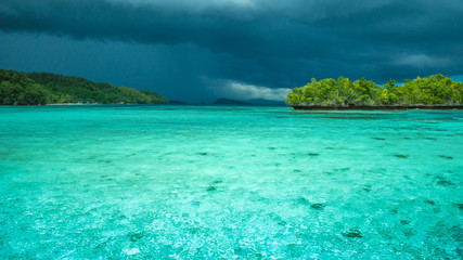 Beautiful Blue Lagoone shortly before Thunderstorm, Gam Island, West Papuan, Raja Ampat, Indonesia