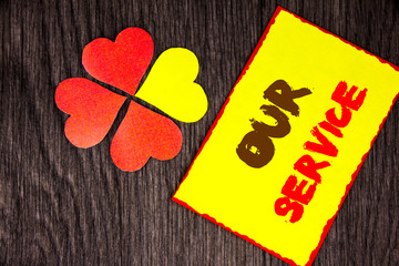 Text sign showing Our Service. Business concept for Customer Marketing Support Help Concept Helping Your Client written on Sticky Note Paper with Love Heart Next to it on the wooden background
