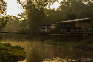 Obraz premium landscape of Suspension bridge in the Morning time , At Khao Yai National Park Thailand