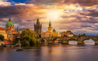 Famous iconic image of Charles bridge at sunset in spring, Prague, Czech Republic. Concept of world...