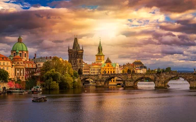 Fototapeten Famous iconic image of Charles bridge at sunset in spring, Prague, Czech Republic. Concept of world travel, sightseeing and tourism. © daliu