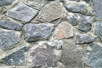 Texture of a stone wall. Can be used as a background