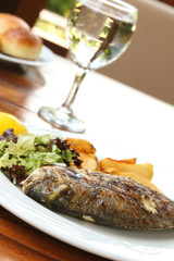 Grilled Dorado with vegetables on the terrace
