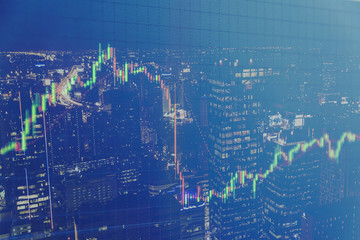 candlestick graph office building background , Business and financial concept