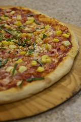 Homemade Pizza on a Wooden Peel