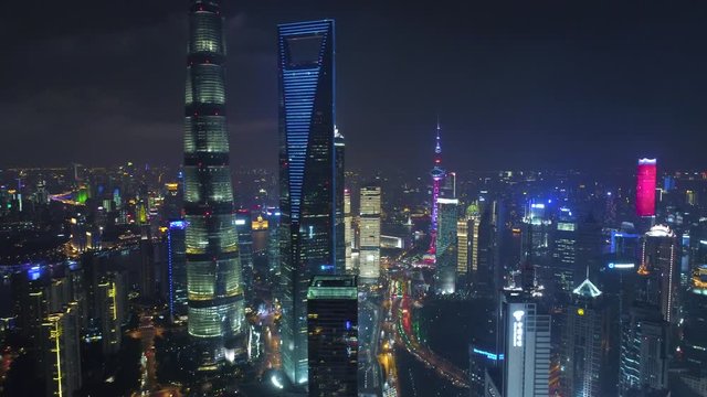 SHANGHAI, CHINA - MAY 5, 2017 Aerial drone video, night time illuminated famous pudong cityscape