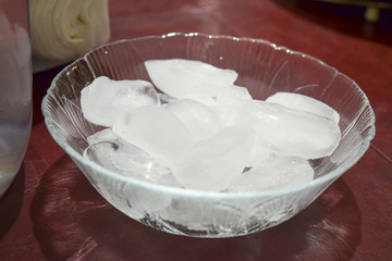 Ice cubes in glass bowl