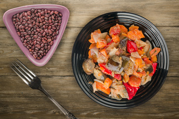 vegetable stew on a wooden background