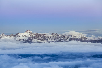Fototapeta na wymiar High mountain range during sunrise in the French Alps