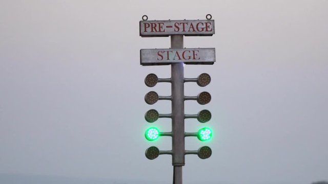 Drag racing street tree light. Stage lamp signal at quarter mile circuit.