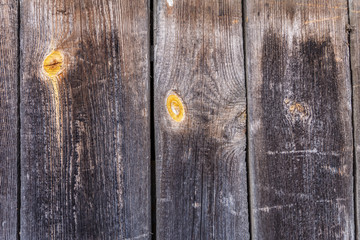 natural wood boards with beautiful texture. Barn wood wall with old, natural, rough boards. Wall texture background pattern. Wooden boards, boards are old with a beautiful branch pattern, style.