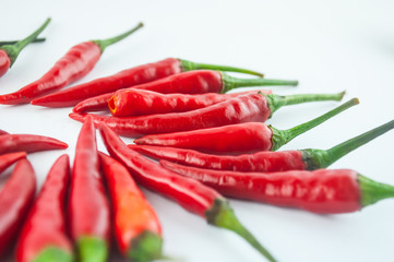 Group of three chili peppers isolated on white background as package design element
