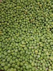 a lot of green peas dry in a local market in Bogota, Colombia