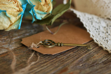 Antique Key and Dried Roses